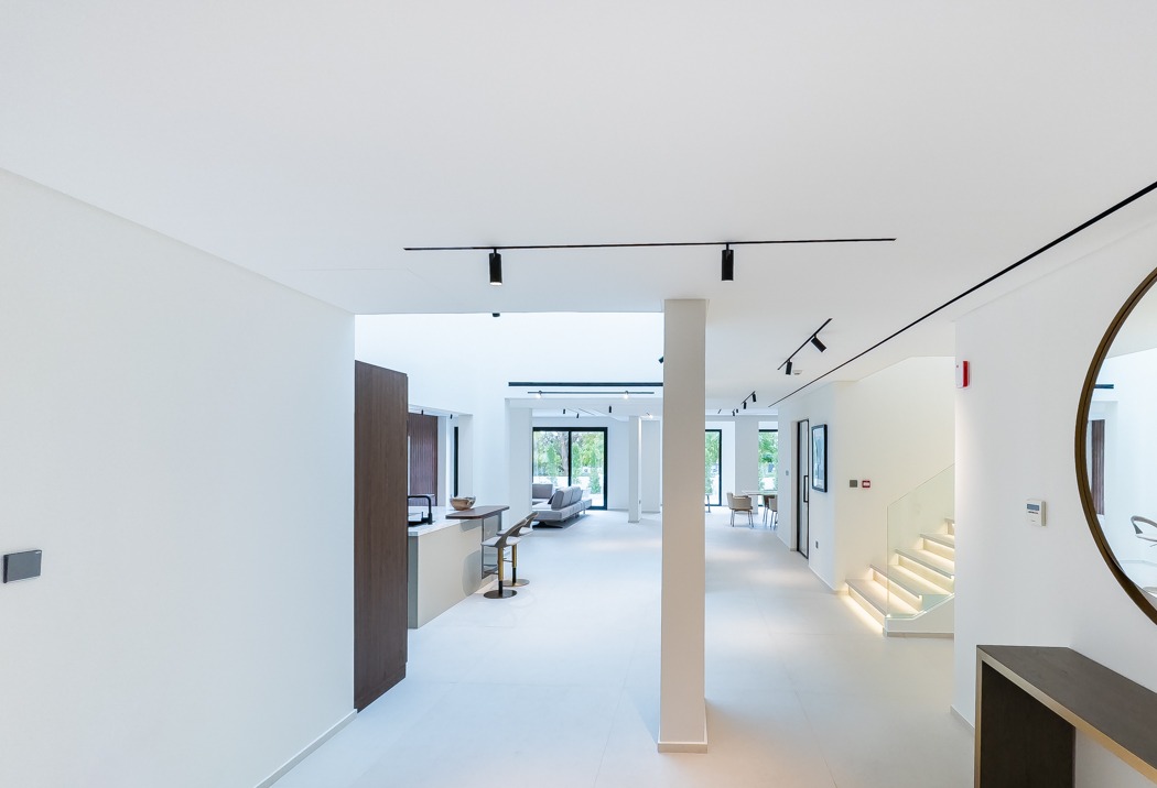 Entrance hall and lit staircase at the Lime Tree Valley villa, Jumeirah Golf Estates