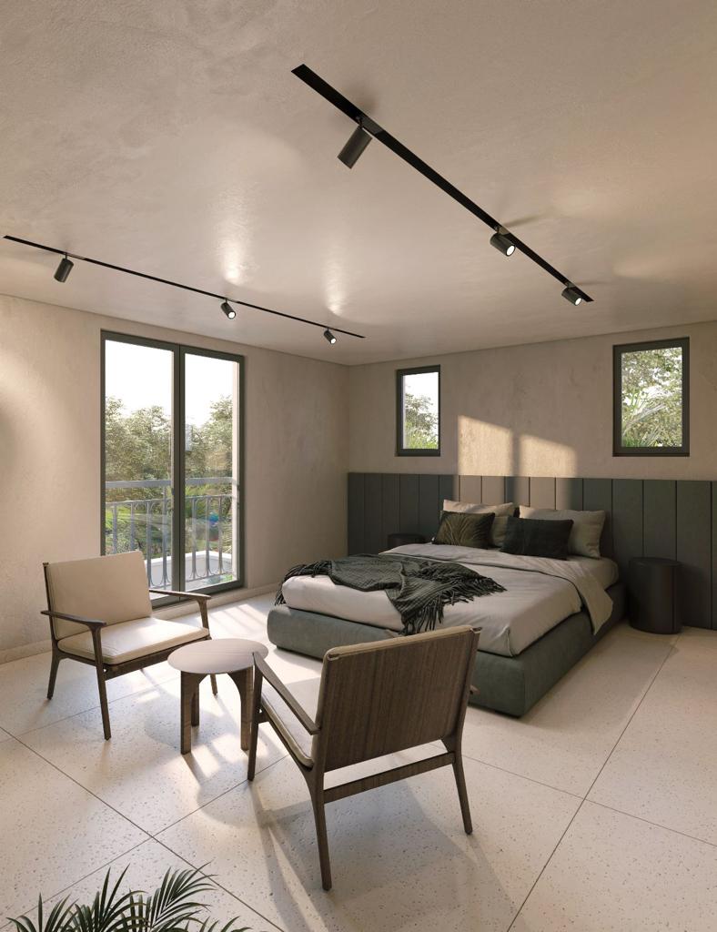Renovated villa bedroom with forest-green joinery, balcony view and warm architectural lighting